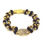 Rudraksha Bracelet in Brass Cap with Om Locket